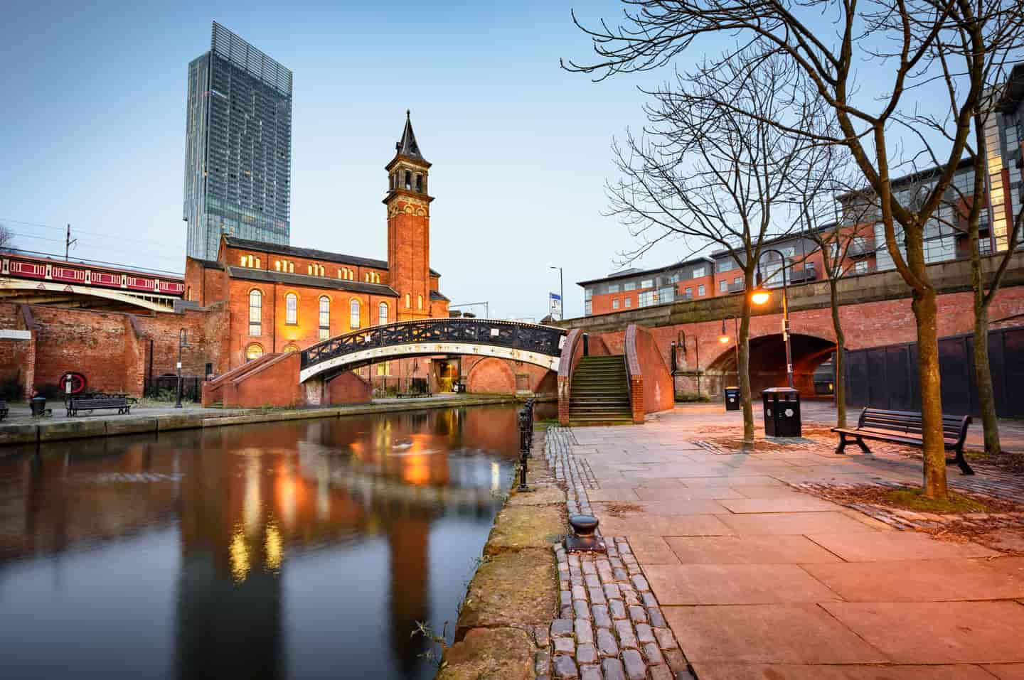 Student Accommodation in Manchester - An Iron Bridge in Castlefield with Beetham Tower in the background