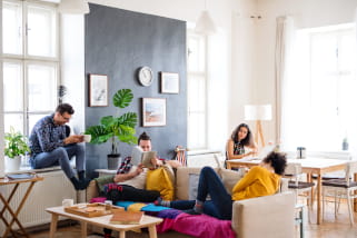 Students hanging out in an apartment